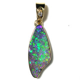 Bright green and violet solid boulder opal pendant