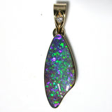 Bright green and violet solid boulder opal pendant