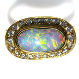 Bright multi coloured solid boulder opal 18k Ring