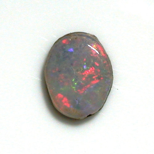 Pink/green milky solid boulder opal