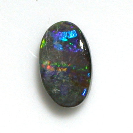 Green multi-coloured solid boulder opal from quilpie