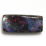 Red multi-coloured solid boulder opal