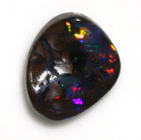Bright red multi-coloured solid black boulder opal from quilpie