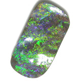 Green , blue and gold solid boulder opal