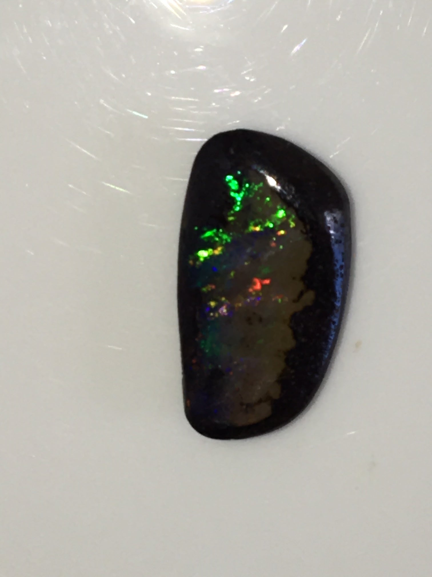 Green Multi coloured solid boulder opal