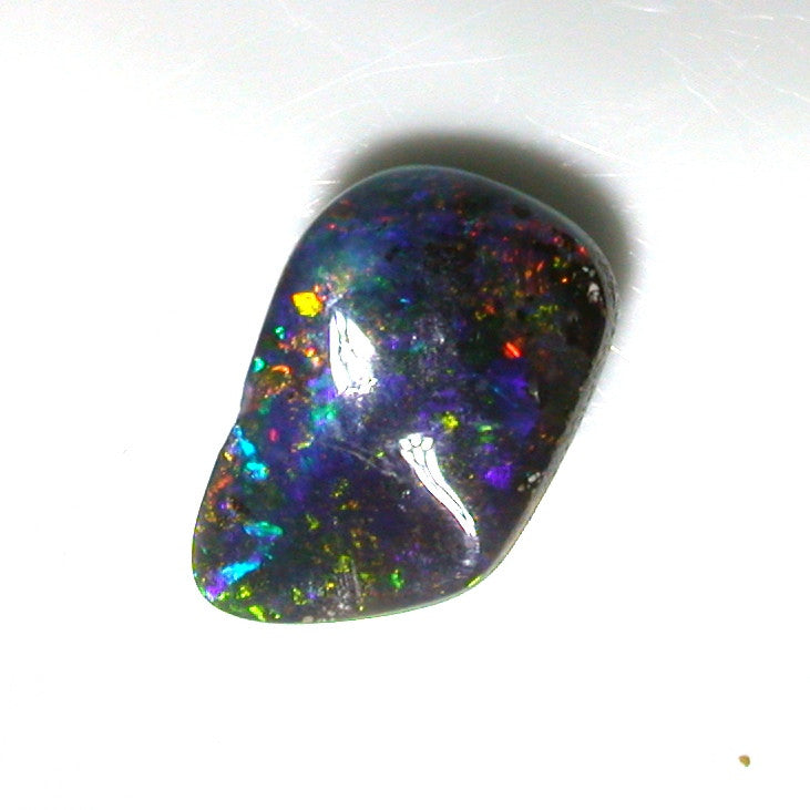Green multi coloured solid boulder opal
