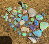 Bright Rubs and Rough Crystal Opal  from Lightning Ridge
