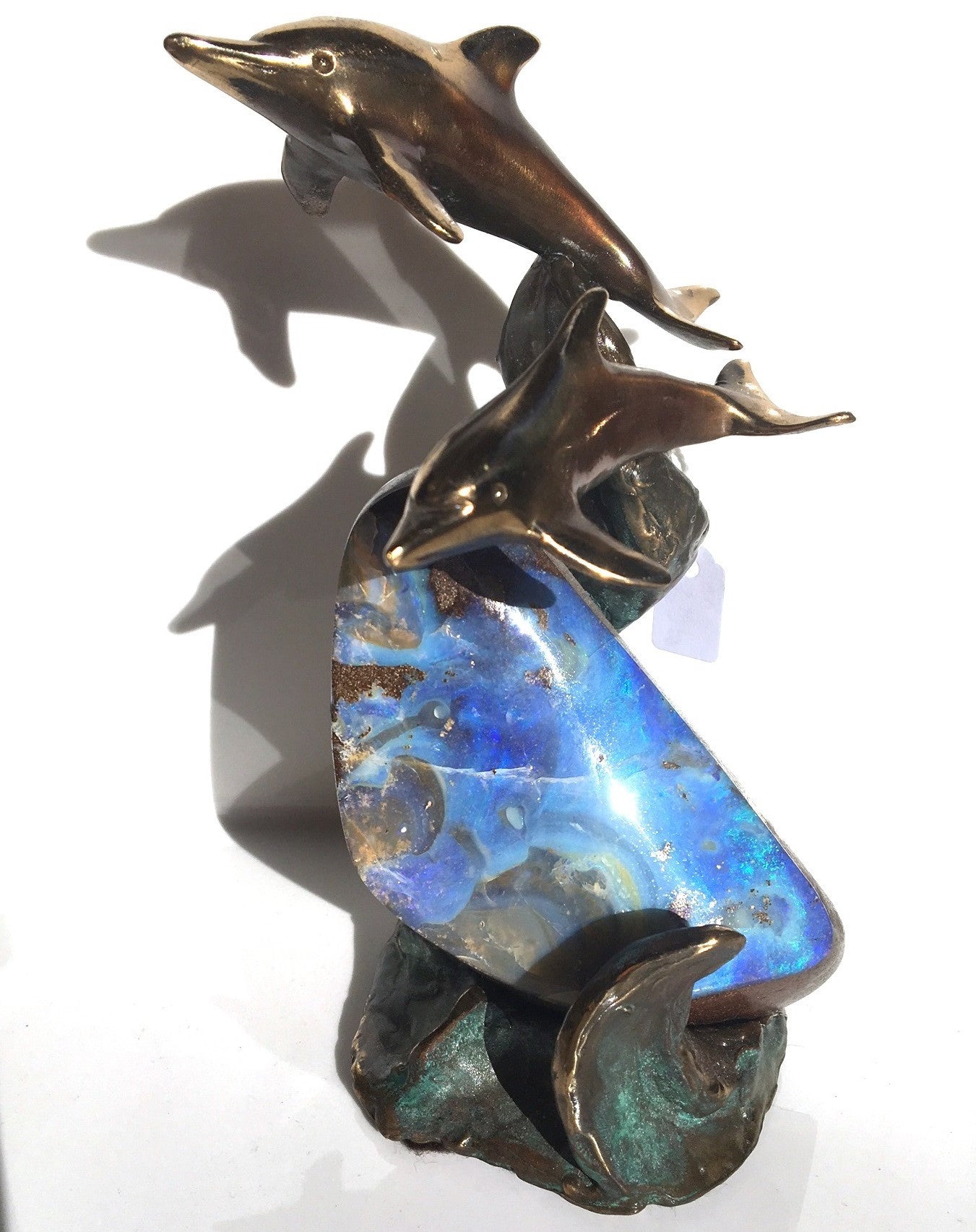Double Bronze Dolphin on Ocean Blue Opal