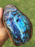 Large green, violet and blue boulder opal polished specimen