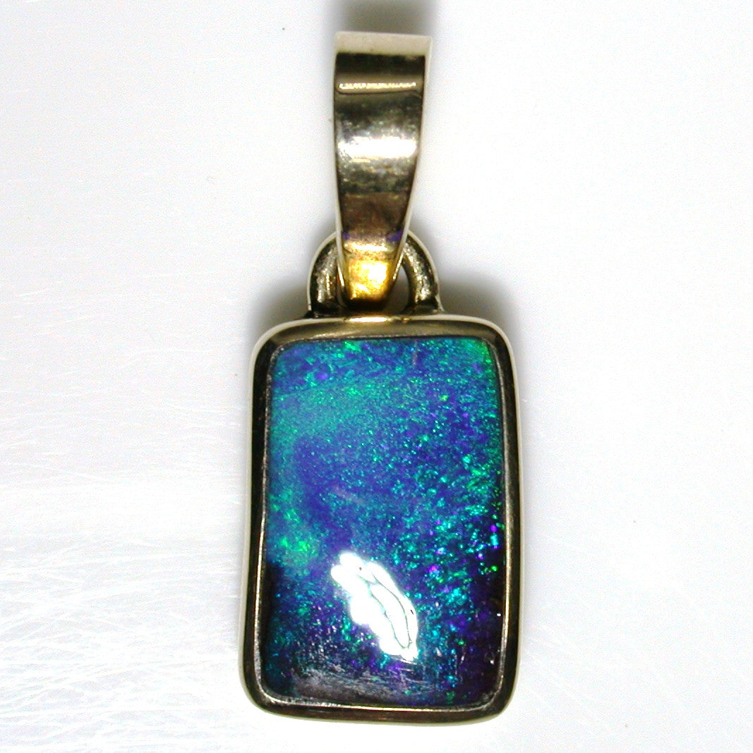 Green, blue solid boulder opal pendant
