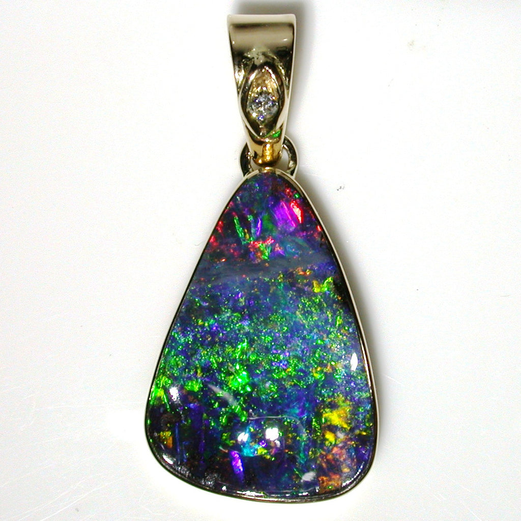 Green, red and blue solid boulder opal pendant