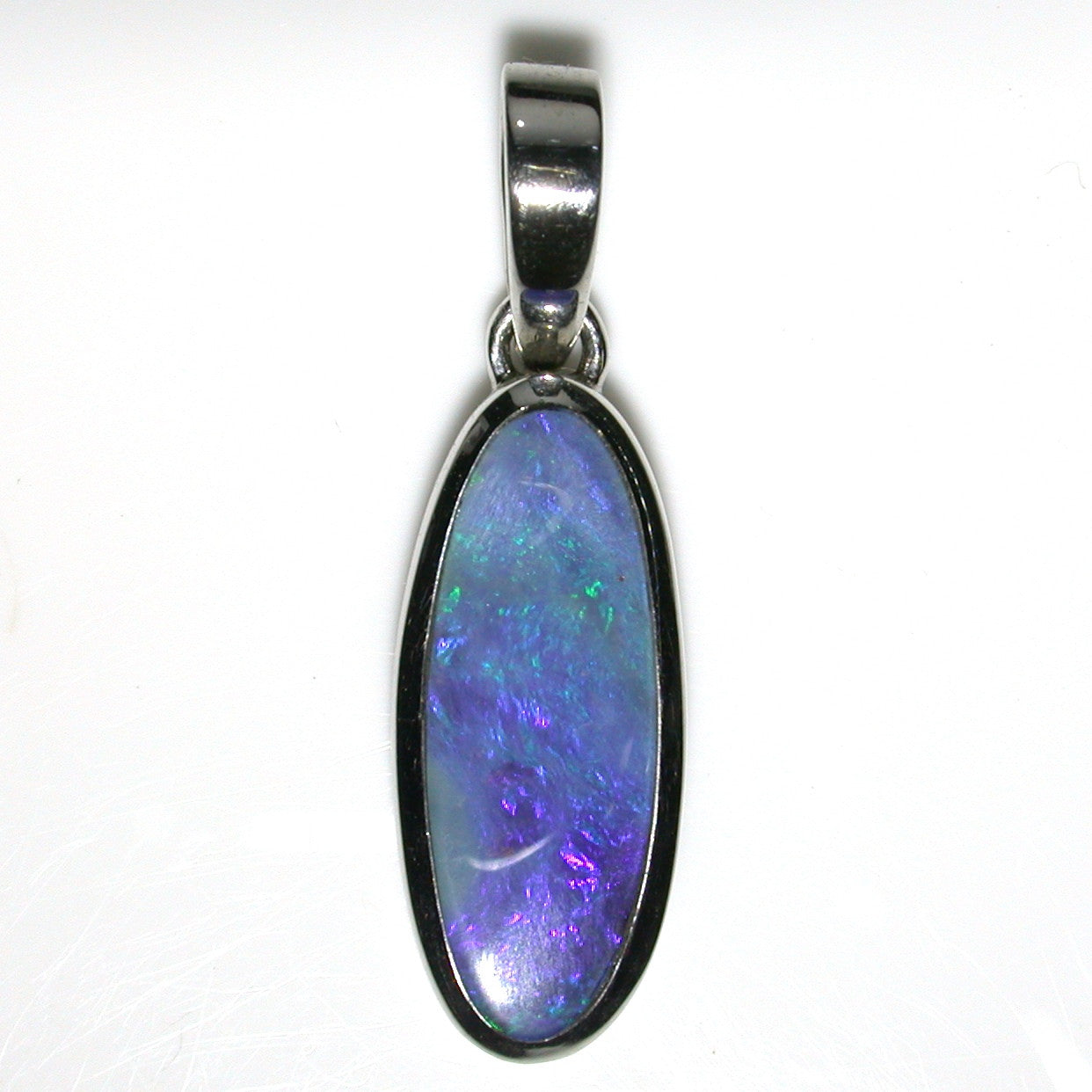 Blue solid boulder opal pendant