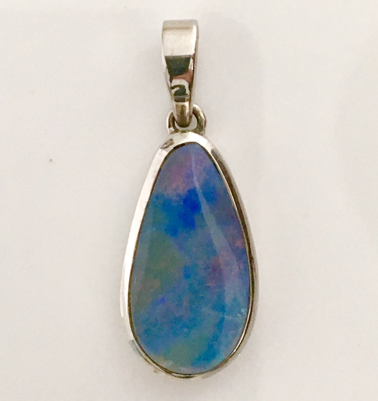 Violet solid boulder opal pendant