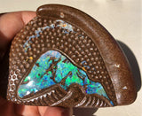 Green multi coloured carved boulder opal polished speciman
