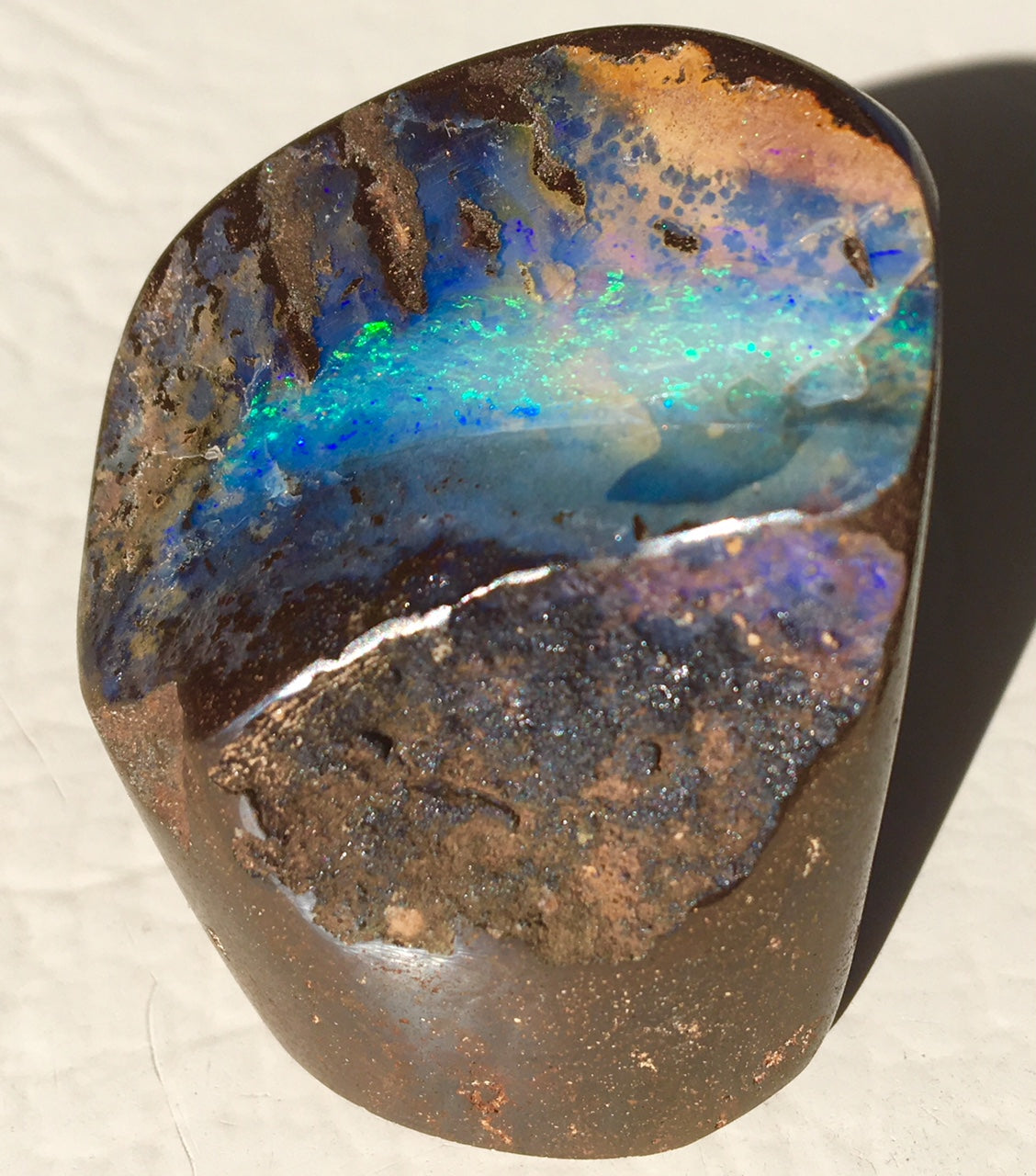 Green boulder opal polished speciman