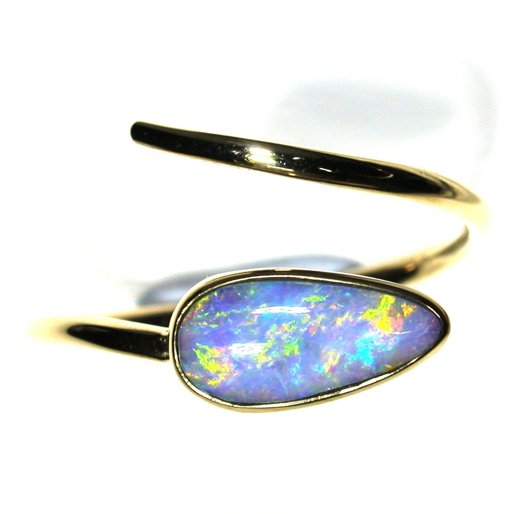 Mixture of pastel colours in a solid boulder opal from Quilpie , 9k Ring