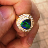 Green, Gold and Blue solid black boulder opal from Quilpie , 18k Ring