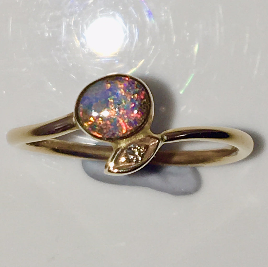 Multi Coloured  solid  boulder opal from Quilpie , 10K Ring
