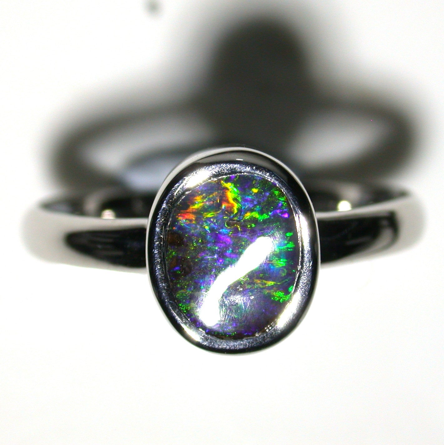 Green, Blue multi coloured solid black boulder opal from Quilpie