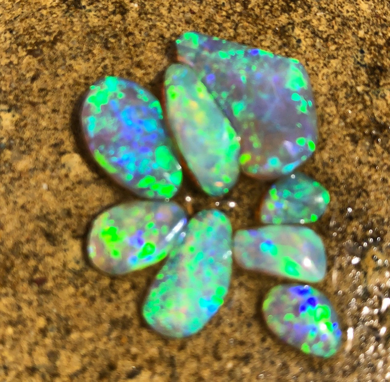 Bright green crystal opal rubs