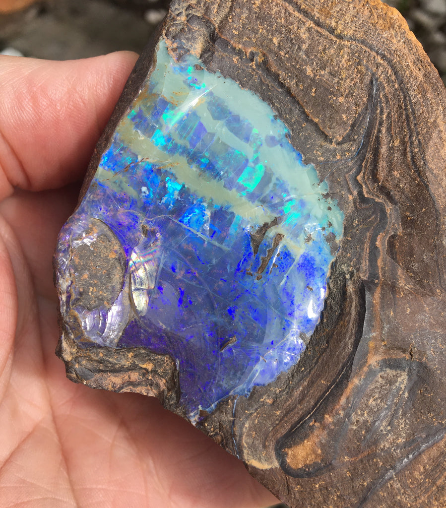 Rough boulder opal beautiful blue green pattern
